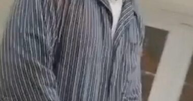Poisoner in his PJs: Moment GP Thomas Kwan is arrested in his pyjamas at his home in dawn raid as he is jailed for 31 years for trying to kill his mother's partner
