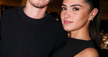Romeo Beckham cosied up to his glamorous girlfriend Kim Turnbull as she accompanied him to the launch of his mother's capsule collection with Mytheresa on Thursday in New York