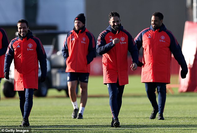 Ruben Amorin, centre, has reportedly delegated his coaching staff different parts of the team