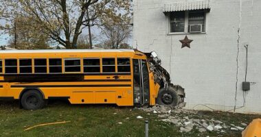 Three people were injured after an Indiana school bus filled with students crashed into a home with family members inside