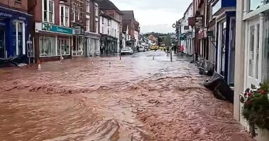 The middle of Tenbury Wells, Worcestershire, was seen submerged in water after the nearby Kyre Brook filled up and broke a wall