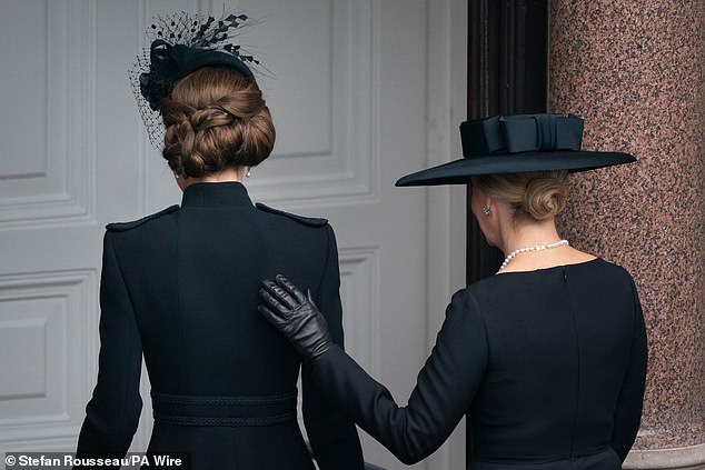 Sophie simply placed her hand on Kate's shoulder as the pair walked off the balcony after the service on Sunday