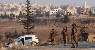 Anti regime fighters hold a position on the outskirts of the northern Syrian city of Aleppo on November 29