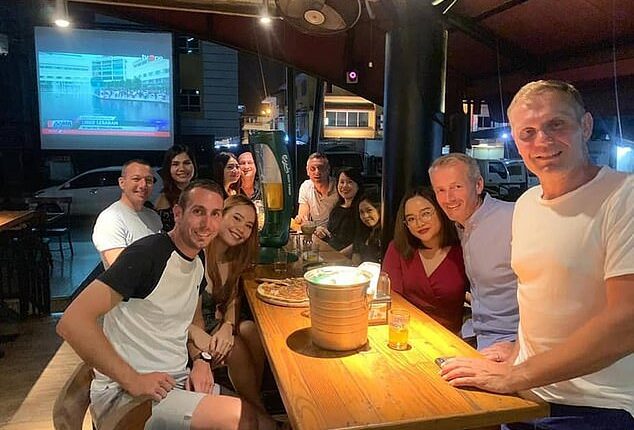 Suspended Premier League referee David Coote (left) was part of a group of officials who enjoyed a boozy night out with a group of young women in Indonesia in 2019. Pictured: Kevin Friend (second right), Martin Atkinson (second left), Andre Marriner (back centre)