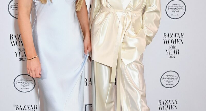 Joined by her daughter Harper, Victoria Beckham was among the guests of honour, slipped into an elegant cream satin trouser suit as she prepared to accept the Entrepreneur Award