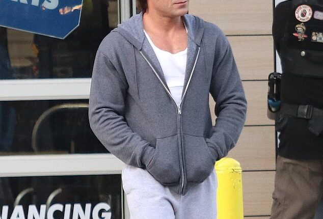 Zac Efron returned to his High School Musical hairdo when he was spotted filming an upcoming project in Los Angeles this week