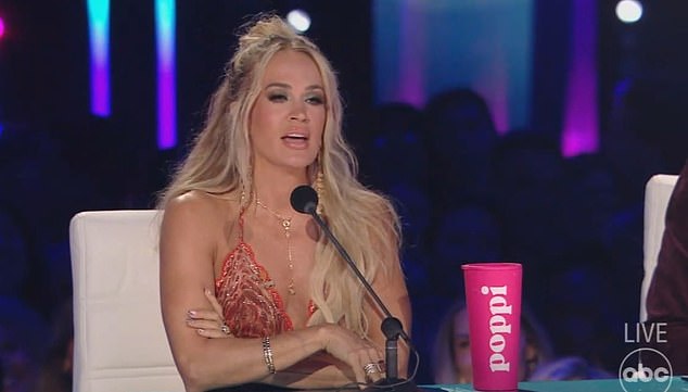 Carrie Underwood stunned fans at the start of Monday's new episode of American Idol by donning a familiar dress from two decades ago.