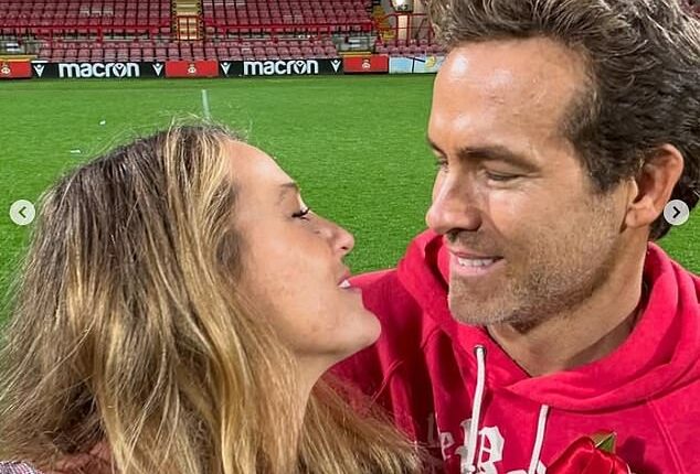 Blake Lively congratulated her husband Ryan Reynolds (pictured) and his football team for 'making history' in a sweet Instagram post after Wrexham AFC won a historic third successive promotion to reach the Championship