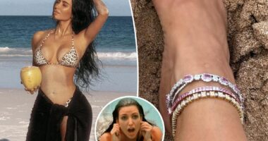 Kim Kardashian wears diamond anklets on beach vacation