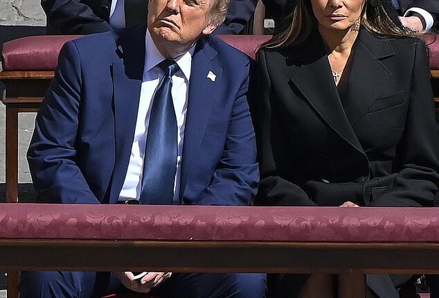 Melania Trump had to step in and help Donald Trump through an awkward moment at Pope Francis ' funeral today after the US president nearly committed a diplomatic faux pas