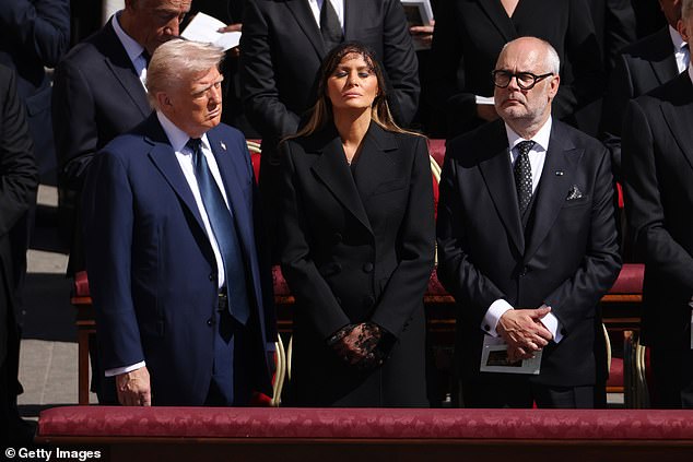 Melania Trump is mourning the 'People's Pope' on her 55th birthday as the First Lady of the US was comforted by her husband Donald Trump in a rare display of affecton