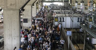 People queue for a taxi at Barajas Airport on April 28, 2025 in Madrid, Spain
