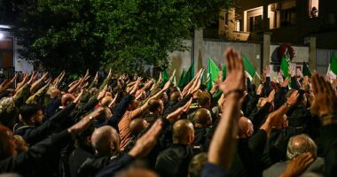 Thousands of neo-fascists rallied in Italy last night, performing the 'Roman salute' in honour pf the death of a member of the extreme right group from 50 years ago