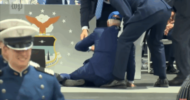 Joe Biden falling down.