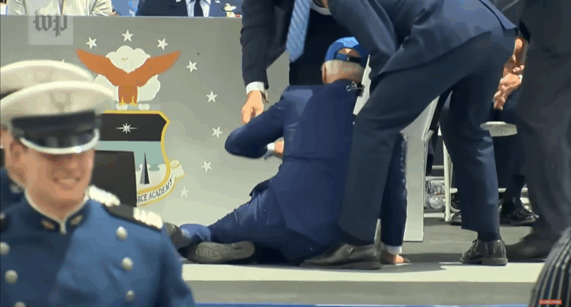 Joe Biden falling down.