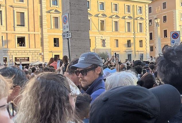 Fans in Rome Thursday caught Harry Styles, 31, in attendance as a new pope was announced, as he blended into the crowd seamlessly like a man of the people