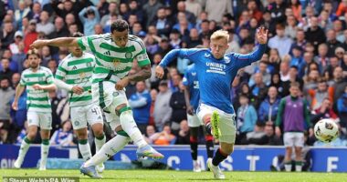 Irish striker Adam Idah fires home the leveller for Celtic during the 1-1 draw  at Ibrox