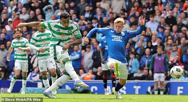 Irish striker Adam Idah fires home the leveller for Celtic during the 1-1 draw  at Ibrox