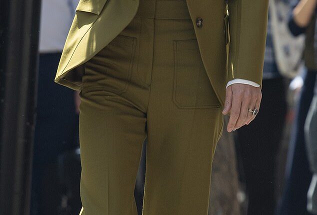 Kate Middleton seen arriving at 180 Strand on Tuesday wearing a £1,340 willow green trouser suit from Victoria Beckham's Spring/Summer collection