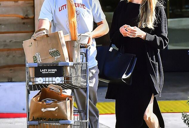 Angelina Jolie's son Knox Léon Jolie-Pitt towered over her during a grocery trip to Lazy Acres Natural Market in LA's trendy Los Feliz neighborhood on Thursday