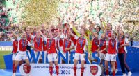 Arsenal Women celebrate with the Champions League trophy after beating Barcelona