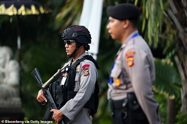 An Australian man has been arrested in Bali after he allegedly tried to smuggle 1.5kg of cocaine into the country via mail from Thailand (stock image of Balinese police officers)