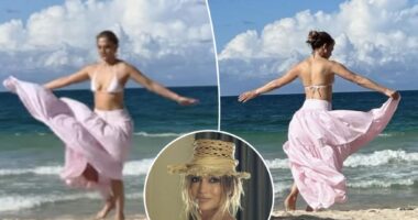 Bikini-clad Jennifer Lopez lets loose on the beach
