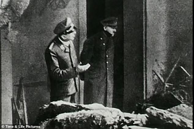 An astonishing cache of documents relating to Hitler's death 80 years ago has been released by Russia's FSB security service. Above: The last known photograph of Hitler, taken outside his bunker in Berlin days before he took his own life