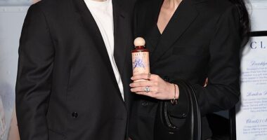 Brooklyn Beckham appears to have made a tentative sign of peace with his parents David and Victoria amid their ongoing family feud (pictured with wife Nicola Peltz)