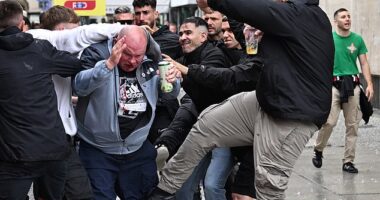 A Chelsea fan was battered and left with a bloody nose after being attacked by Betis fans