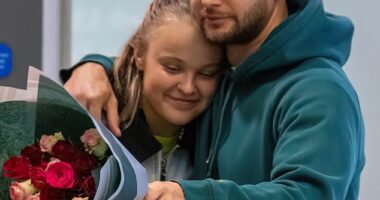 Chris Hughes enjoyed a cosy night in with JoJo Siwa on Sunday after he picked her up at Heathrow airport with a large bouquet of red roses