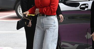 Coleen Rooney, 39, showed her allegiance to another famous WAG by wearing a key fashion item as she stepped out in Manchester on Thursday
