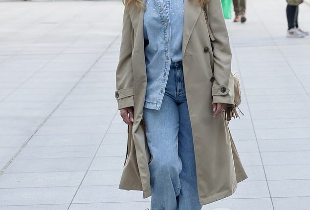 Dannii Minogue (pictured) was looking chic as she made her way out of a radio interview on Tuesday