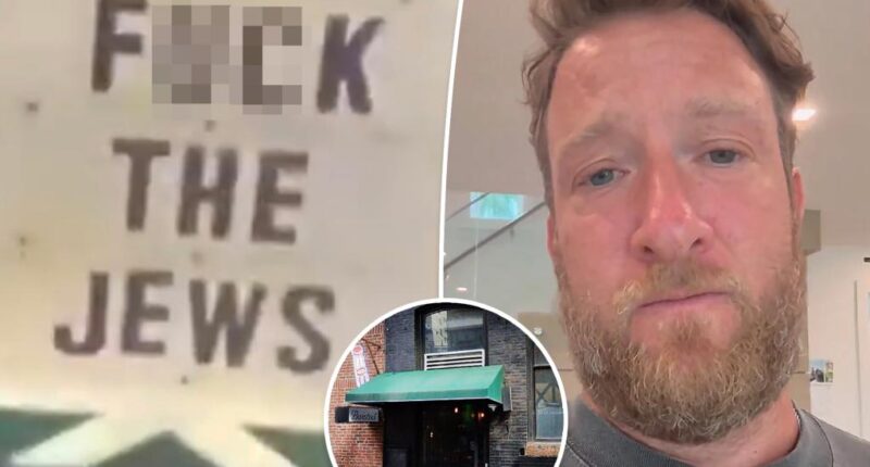Dave Portnoy reacts to antisemitic sign at Barstool bar