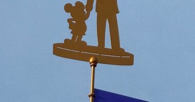 A golden figure of famed creator Walt Disney at California's Disneyland appears to have been modified after it gained notice for somewhat resembling Donald Trump