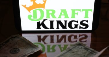 DraftKings says lack of March Madness upsets kept it from raising its forecast, but shares gain