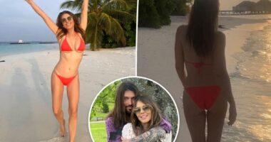 Elizabeth Hurley frolics in red bikini after debuting Billy Ray Cyrus romance