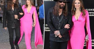 Elizabeth Hurley makes red carpet debut with Billy Ray Cyrus in Barbie-pink gown