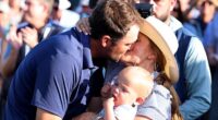 Scheffler and his wife, Meredith, shared a kiss after he won the PGA Championship on Sunday