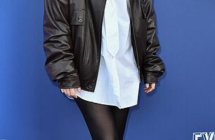 Erin Doherty looked stylish in an oversized white shirt dress