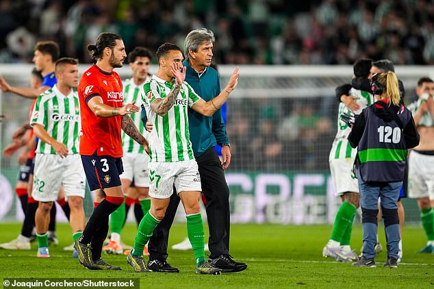 Manuel Pellegrini and Antony are pictured after Real Betis' win over Osasuna earlier this month