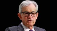Fed stands pat on interest rates, warns of possible economic woes