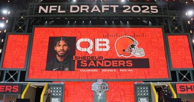 A screen shows Colorado quarterback Shedeur Sanders' name after being selected by the Cleveland Browns with the 144th overall pick during the fifth round of last month's draft