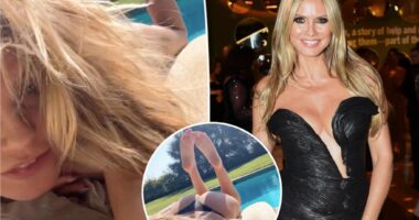 Heidi Klum sunbathes in nothing but thong bikini bottoms