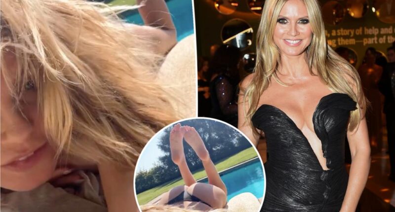 Heidi Klum sunbathes in nothing but thong bikini bottoms
