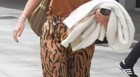 Helen Skelton looked stylish in tiger print trousers as she left the BBC studios separately to Gethin Jones as they try to keep their 'deeper connection' under wraps