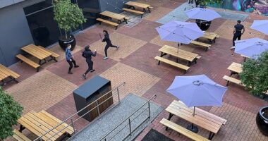 A Melbourne shopping centre has been plunged into lockdown over reports of a knife fight