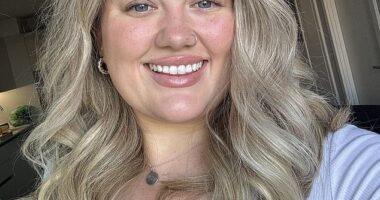 Sophie Ellis (pictured), from Manchester, was waiting for her Hinge match at her local Flight Club when her date texted to let her know his Uber had been delayed