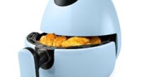 A Melbourne office worker has shared a viral video showcasing how she uses the new Kmart Mini Air Fryer,$35, at her desk