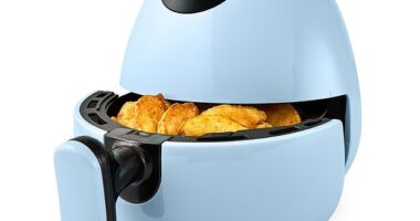 A Melbourne office worker has shared a viral video showcasing how she uses the new Kmart Mini Air Fryer,$35, at her desk